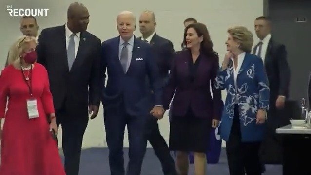 gretchen whitmer biden hold hands