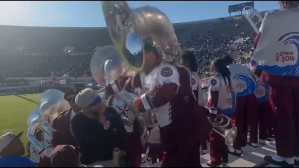 college band member tuba fight