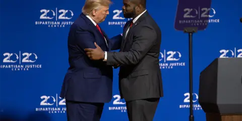 donald trump and byron donalds shaking hands