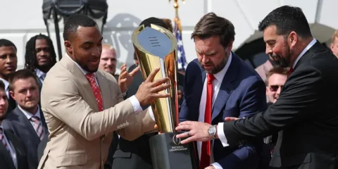 vp jd vance with ohio state trophy