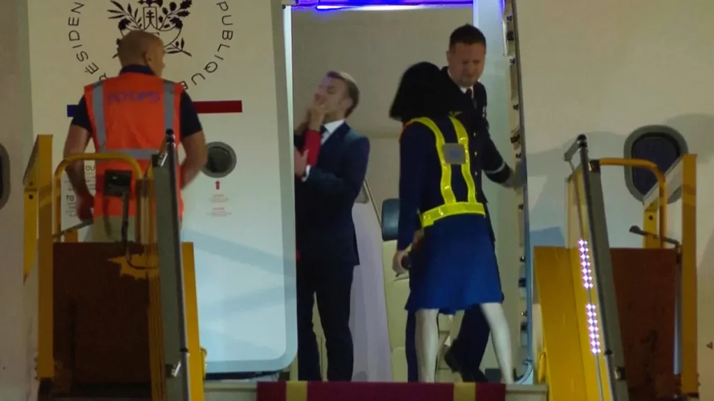 macrons face shove