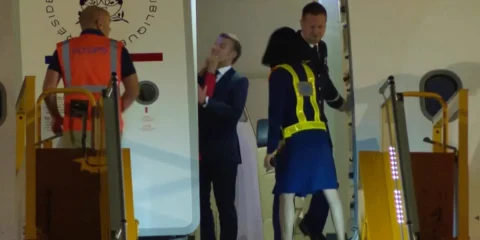 macrons face shove
