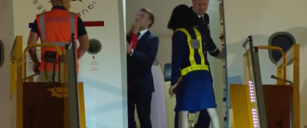 macrons face shove