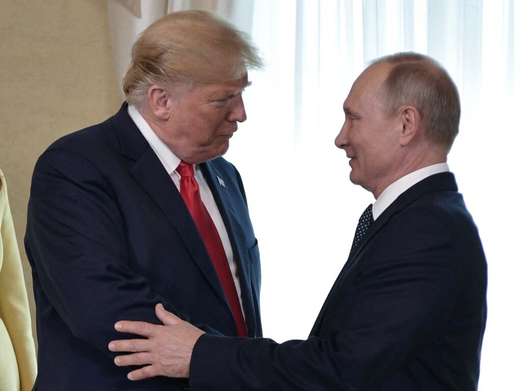trump putin handshake